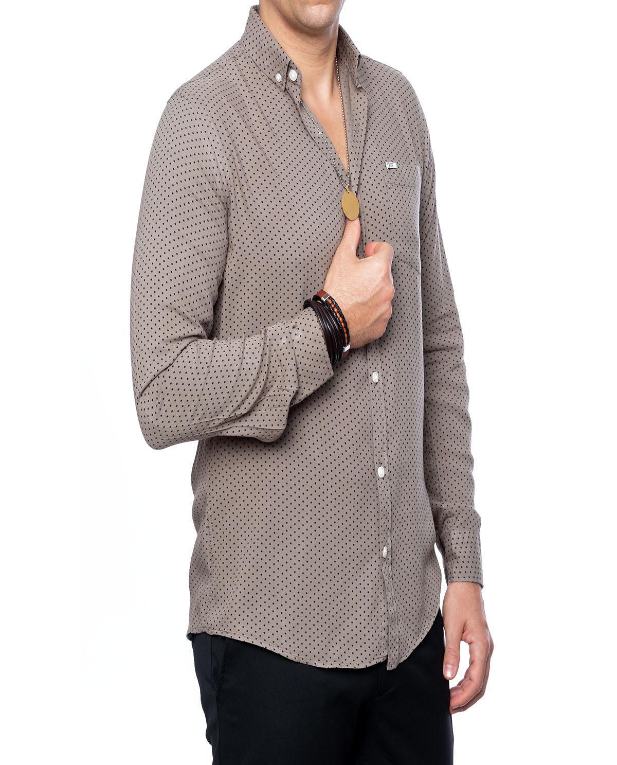 Chemise verte avec petits points